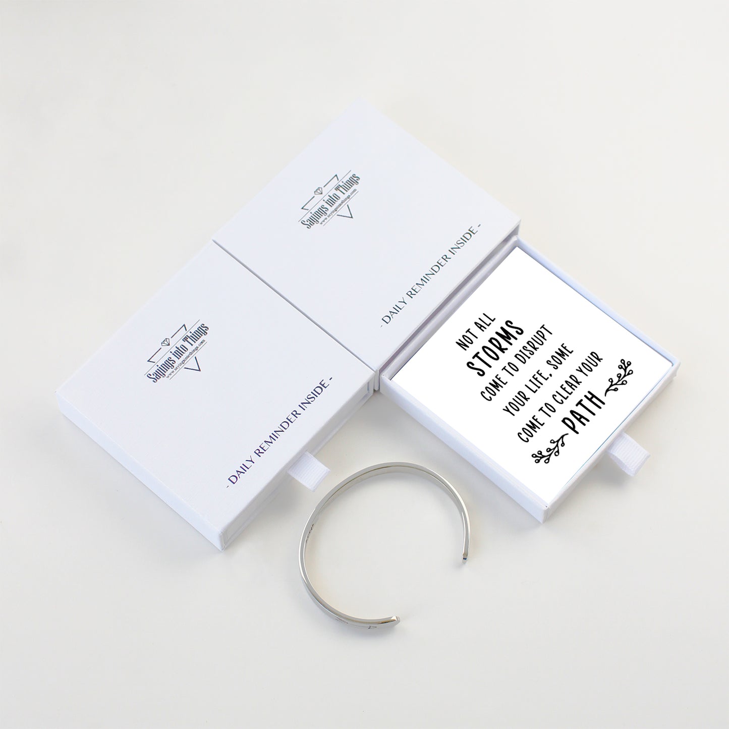 "Not all storms come to disrupt your life, some come to clear your path." Inspirational Message Bracelet Cuff